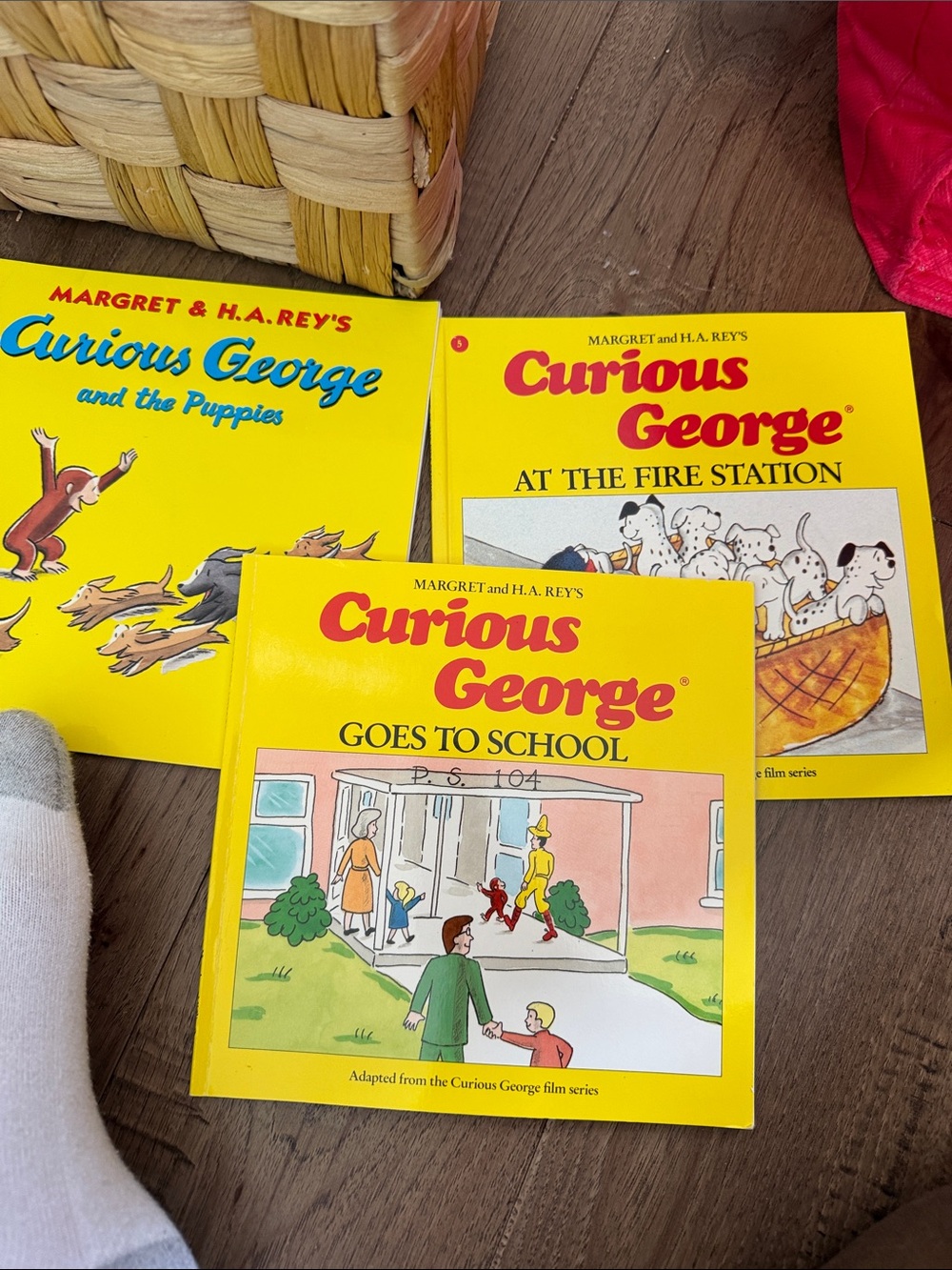 3 Curious George softcover books